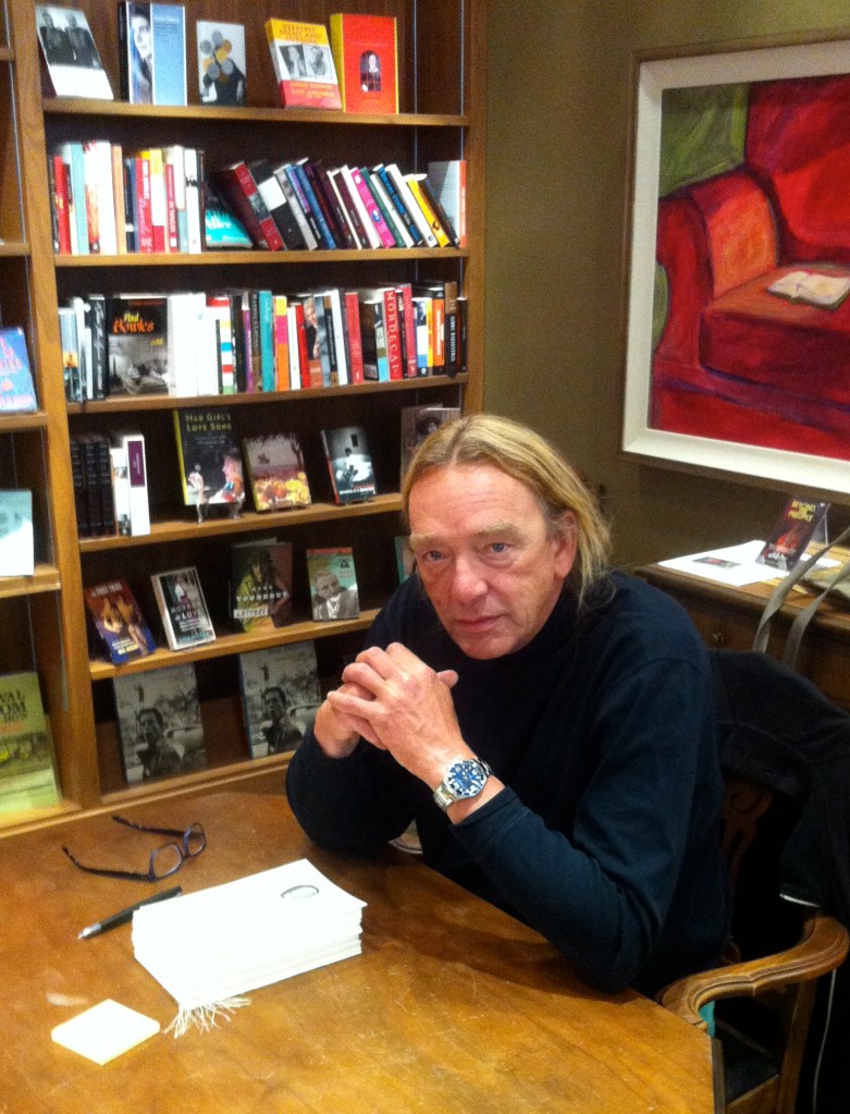 Hard at work, signing and numbering the books. I'm actually much better looking than this in real life. 